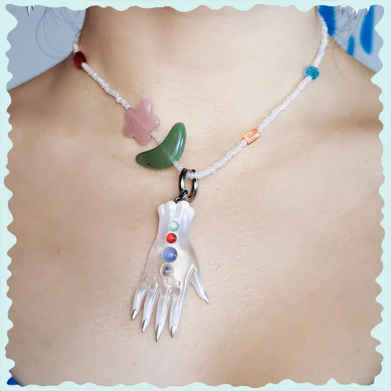 The colorful white fairy goblin hands earring, necklace & hairclips