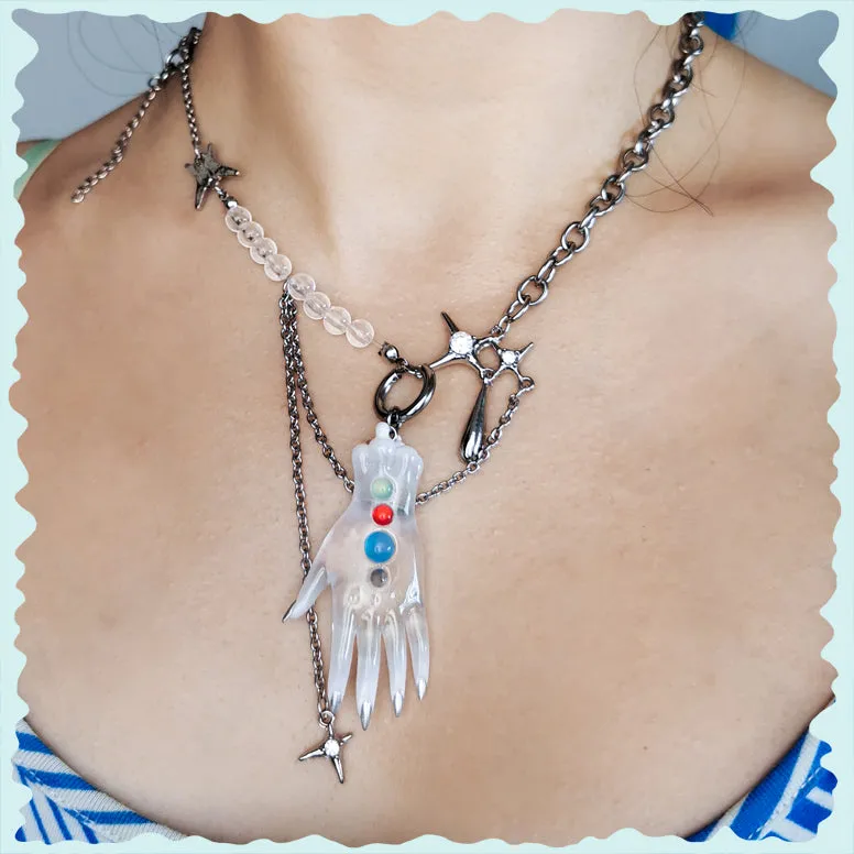 The colorful white fairy goblin hands earring, necklace & hairclips