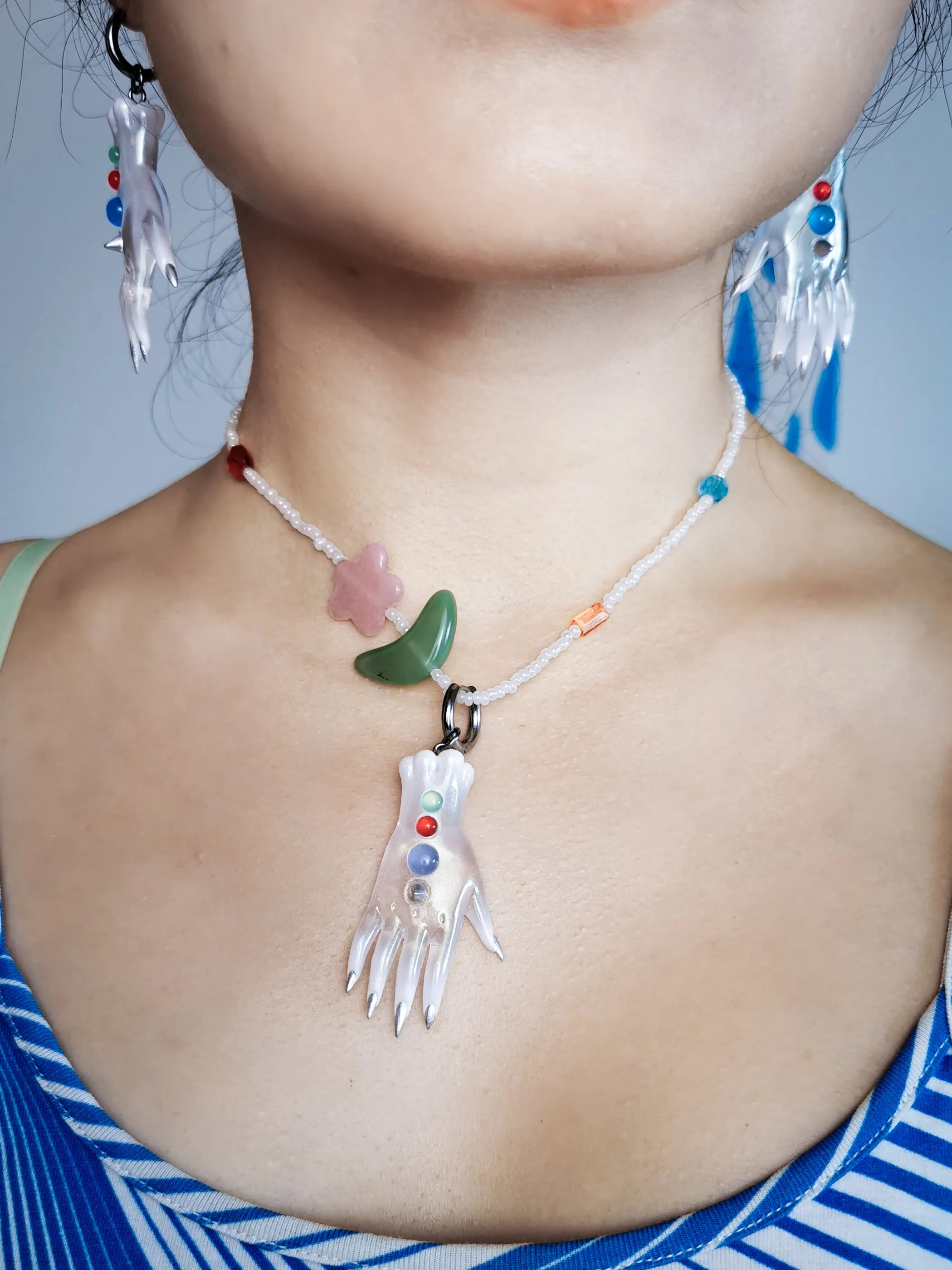 The colorful white fairy goblin hands earring, necklace & hairclips